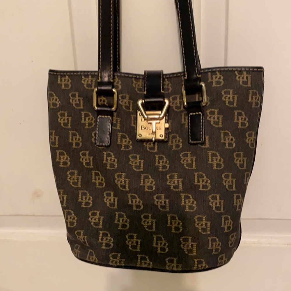 Dooney & Bourke black bag used 11 inches wide & 10 inches tall